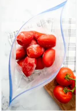 zip bag with frozen cherry tomatoes
