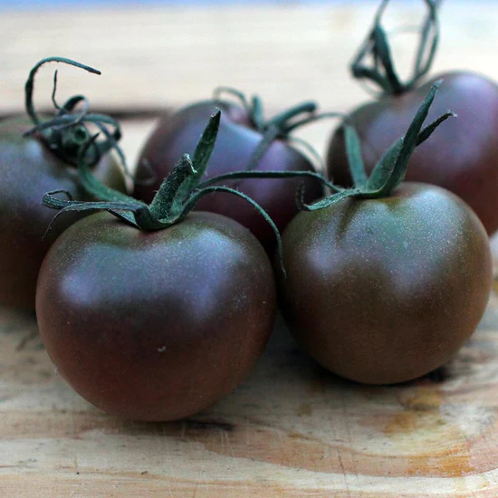 Stars on top of my black cherry tomatoes : r/mildlyinteresting